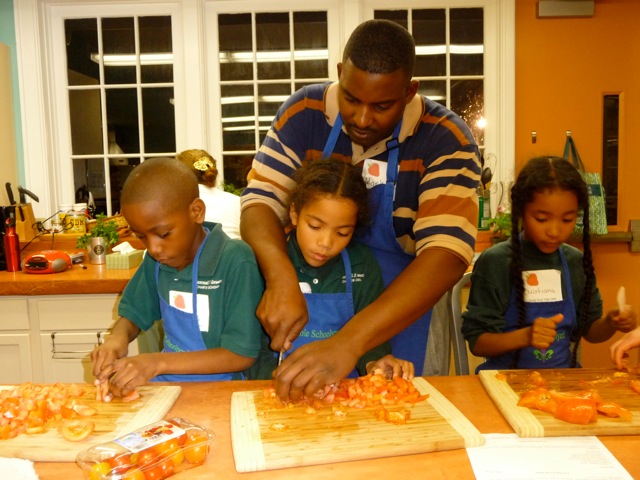 Family food night cooking together as a family