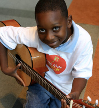 Little boy with guitar